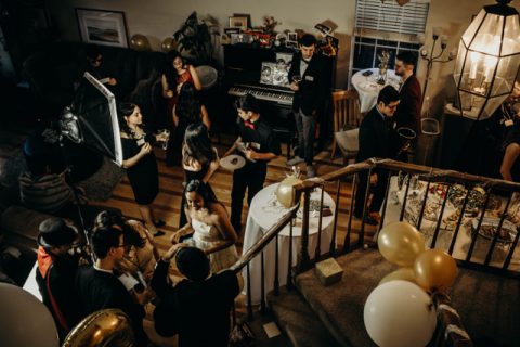 Night of Mystery | POM 4/18: Lights! Camera! MURDER!!! Old Hollywood Style a group of people playing instruments
