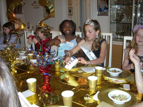 Night of Mystery | A Killer 11th Birthday Party a group of people around a table