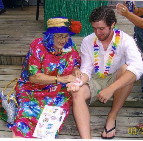 a man and woman sitting on a bench