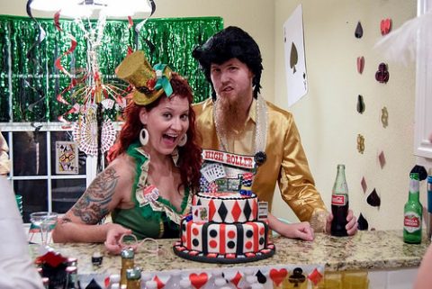 Night of Mystery | HOW TO WIN A FREE PARTY! a man and woman cutting a cake
